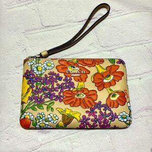 COACH Corner Zip Wristlet In Brown Signature Canvas With Wildflower Print nwt